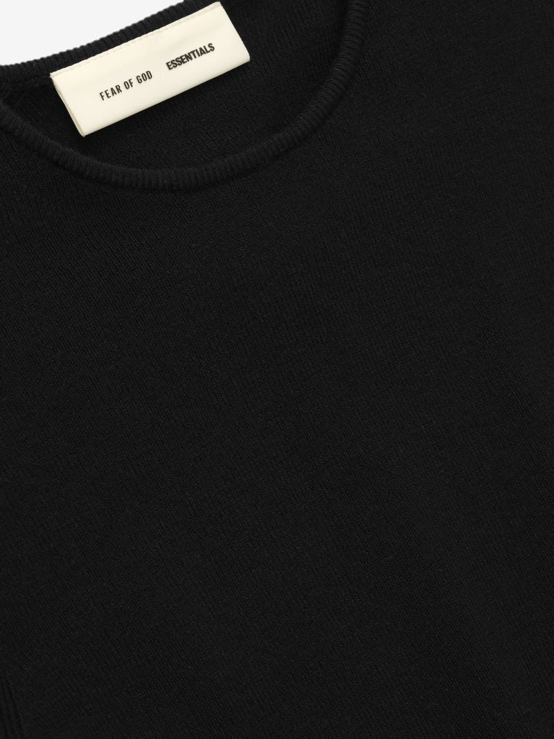 close-up of black poly-nylon rib knit fabric and crew neckline detail on women's long sleeve top